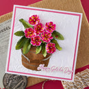 Greeting card with pink flowers in a basket and 'Happy Gotcha Day' text on a textured surface.