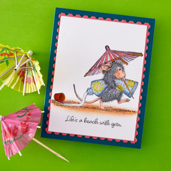 Card with a mouse illustration and beach-themed text on a green background with small paper umbrellas.