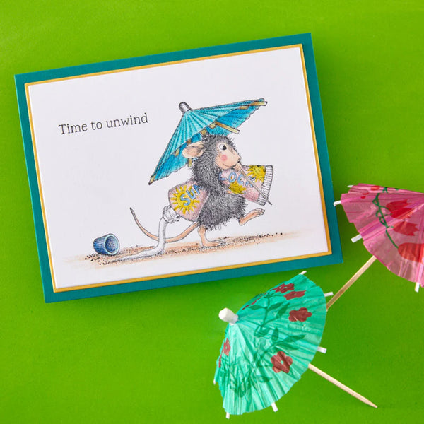Card with a mouse holding a blue umbrella and small umbrellas on a green background