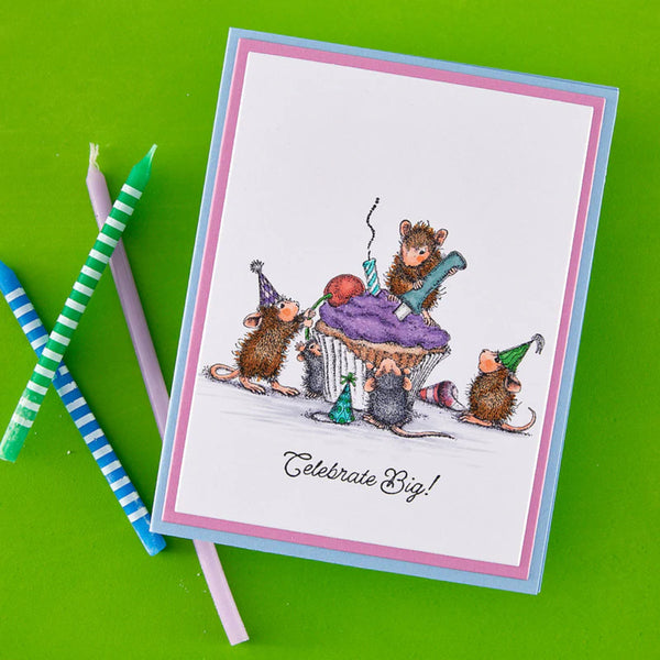 Greeting card with cartoon mice celebrating a birthday on a green background
