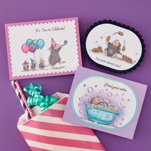 Three greeting cards with cartoon characters on a purple background