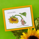 Card with a mouse and sunflower design on a green background