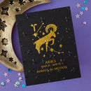 Black card with Aries zodiac illustration on a purple background