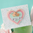 Card with heart design and 'Mr. & Mrs.' text on a light blue background