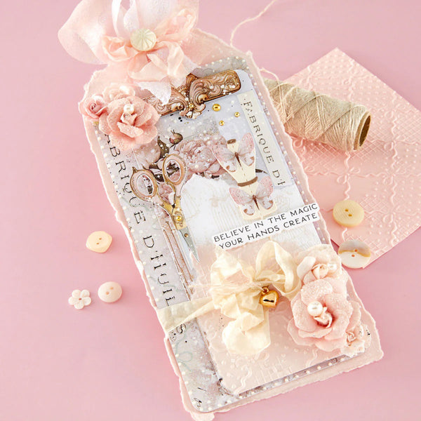 Decorative card with floral elements and text on a pink background