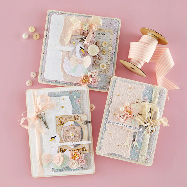 Decorative greeting cards with floral elements and ribbons on a pink background