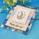 Greeting card with a rabbit illustration and 'Happy Spring!' text on a floral background.