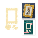 Spellbinders Angel Mourning Card Dies set, showing the cream-colored embossed frame, flower, and leaf dies, a finished example card, and the dark green retail packaging.