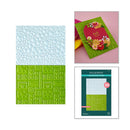 Collection of embossing folders and a card with floral design on a white background