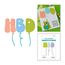 Colorful balloon-shaped cutting dies with packaging and a card featuring a green monster design.