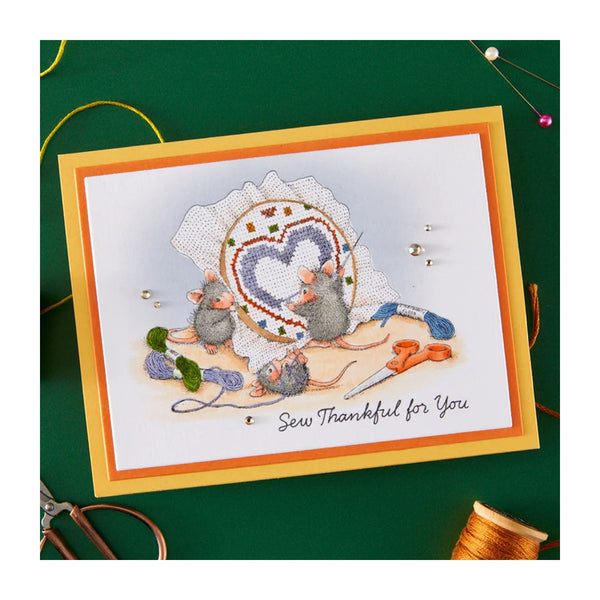Card with embroidered design of mice around a hoop with thread, text 'Sew Thankful for You', on a green background.