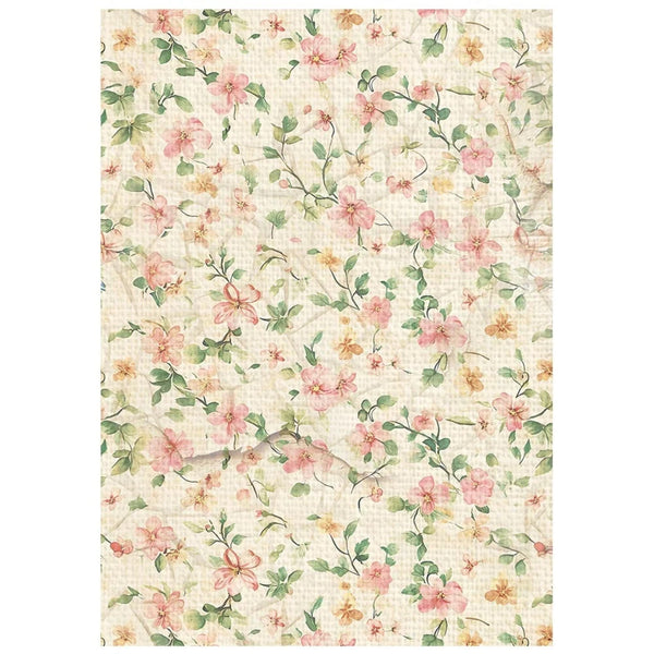 Floral patterned paper with pink and green flowers on a beige background
