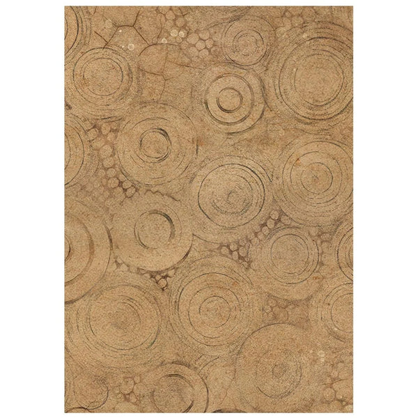Textured brown paper with circular patterns on a white background