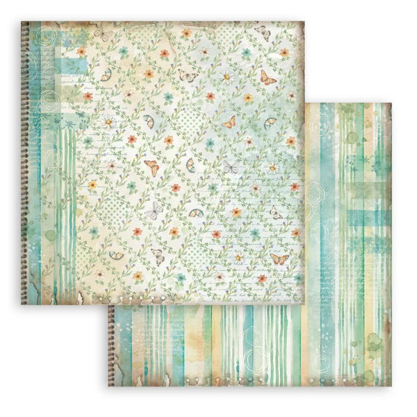 Two spiral-bound notebooks with floral and striped designs on a white background
