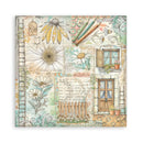 Decorative notebook cover with floral and architectural design on a white background