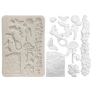 Silicone mold with floral and butterfly designs on a white background