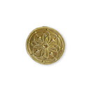 Decorative gold emblem with intricate design on a white background
