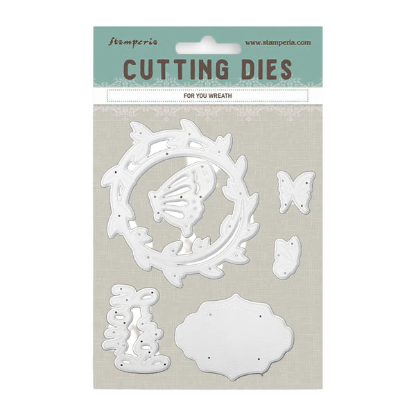 Set of white cutting dies with decorative elements on a beige card, featuring Stamperia branding.