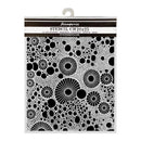 Stamperia stencil with black circular patterns on a white background