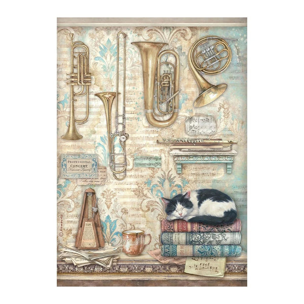 Cat sleeping on books with musical instruments and decorative elements in the background