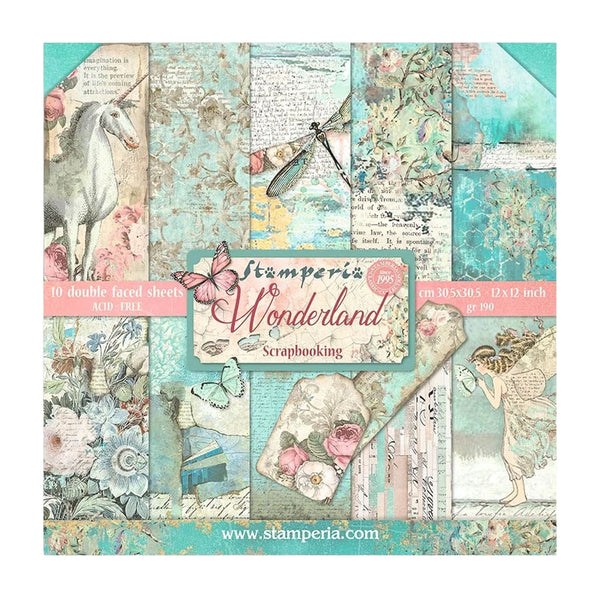 Collection of Stamperia Wonderland scrapbooking paper sheets with fantasy designs.