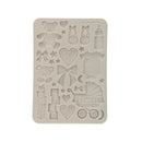Silicone mold with baby-themed shapes on a white background