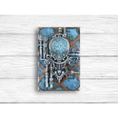 Decorative wall art with clock design on a wooden surface