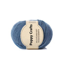 Blue ball of yarn with a Poppy Crafts label on a white background