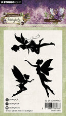 Silhouette stamps of fairies on a purple and green background with Studio Light branding.