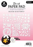 Die-cut paper pad with floral and butterfly designs on a pink background