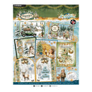 Studio Light Christmas scrapbooking paper sheet featuring vintage holiday illustrations, including a green car in a snowy village, a fairy, a deer, and festive text frames on a light blue background.