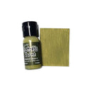 Bottle of Tim Holtz Distress Paint with a swatch of green color on a white background