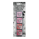 Packaging of Tim Holtz Distress Oxide ink pads with a grungy background.