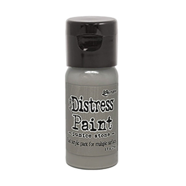 Bottle of Tim Holtz Distress Paint on a white background