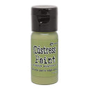 Bottle of Tim Holtz Distress Paint with black cap on a white background