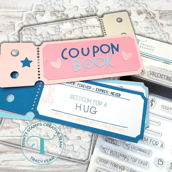 Coupon book with pink and blue design on a wooden surface
