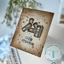 Card with batteries and 'Stay Positive' text on a textured background, featuring Trinity Stamps logo.