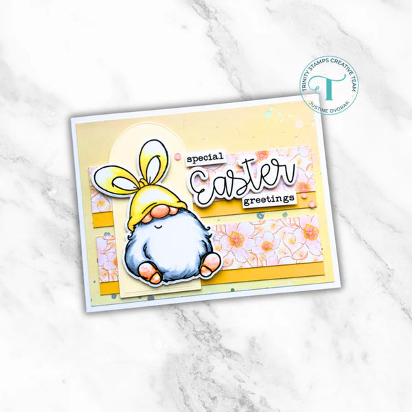 Gnome with bunny ears on a 'special Easter greetings' card with a marble background