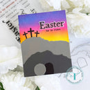 Easter card with 'he is risen' text and cross silhouette on a colorful background.