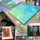 Collage of art projects on a table with various materials.