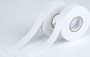 Roll of white tape on a light gray background
