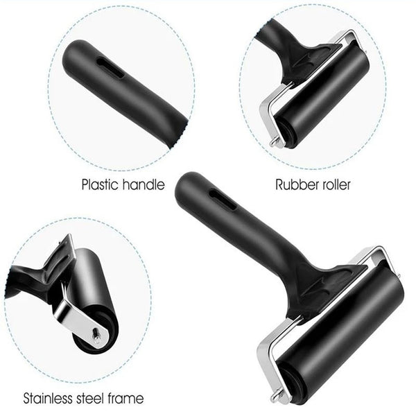 Dog grooming tool with plastic handle, rubber roller, and stainless steel frame on a white background.