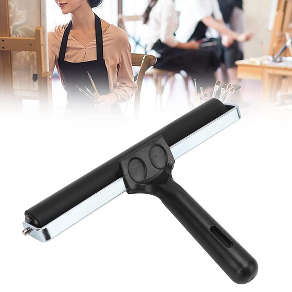 Black squeegee with a blurred background of people in an art studio.