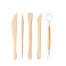 Set of wooden tools with metal components on a white background