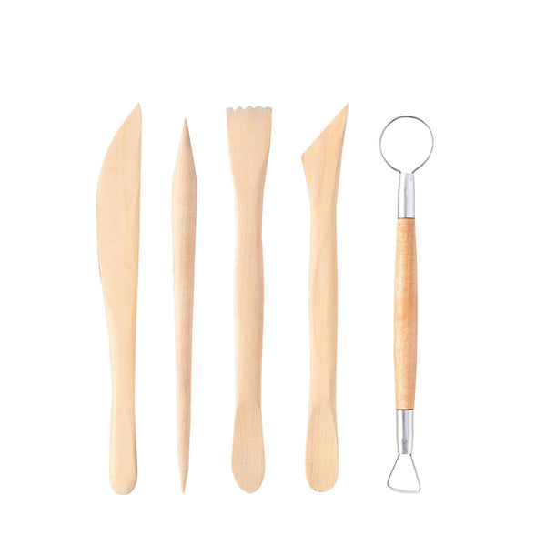 Set of wooden tools with metal components on a white background