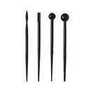 Set of four black hair styling tools on a white background