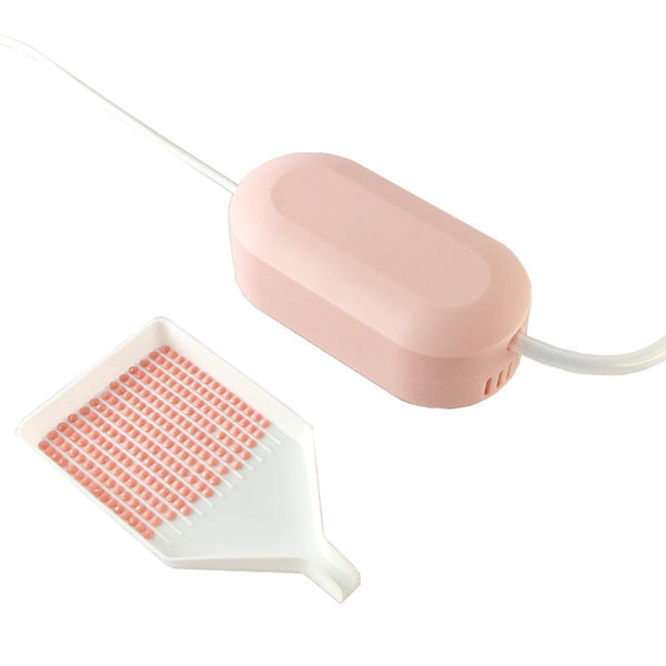 Pink and white hair removal device on a white background