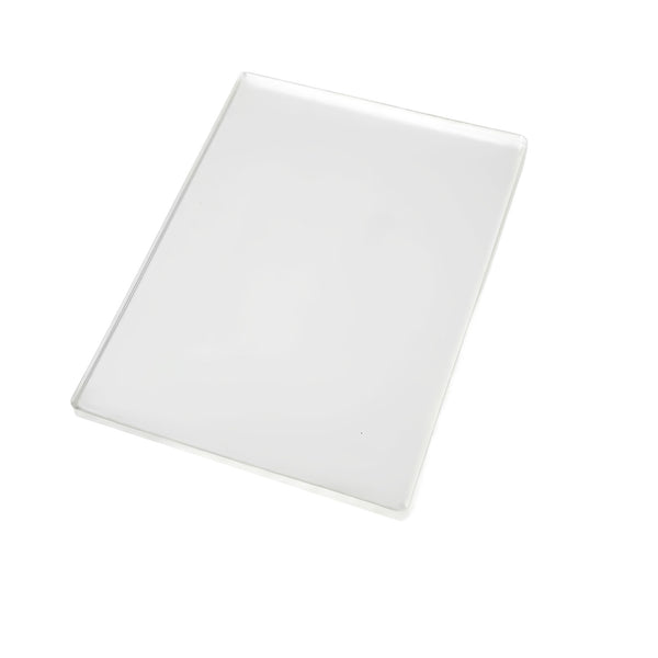 Rectangular white cutting board on a white background