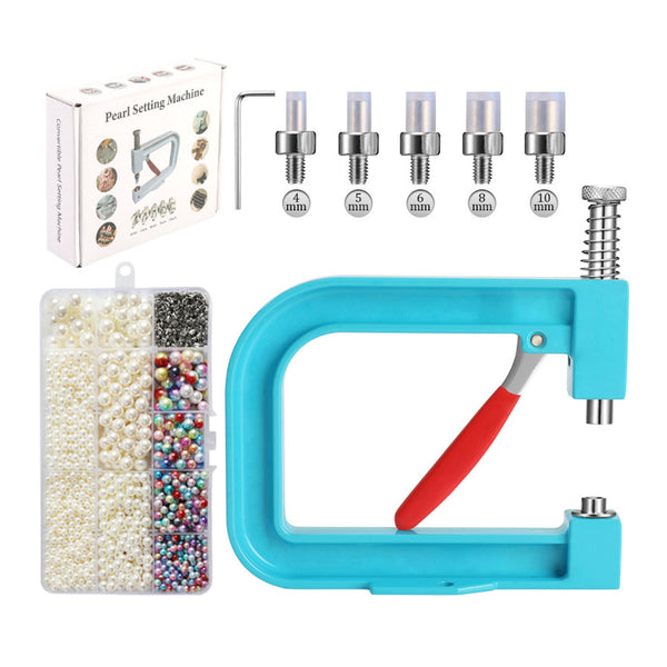 Pearl setting machine with pearls, tools, and packaging on a white background