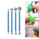 Set of blue tools with silver ends, including a green tool being used on a ceramic item.
